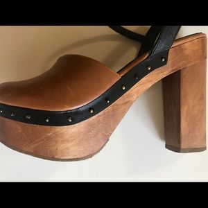 Five Worlds wood and leather platforms
